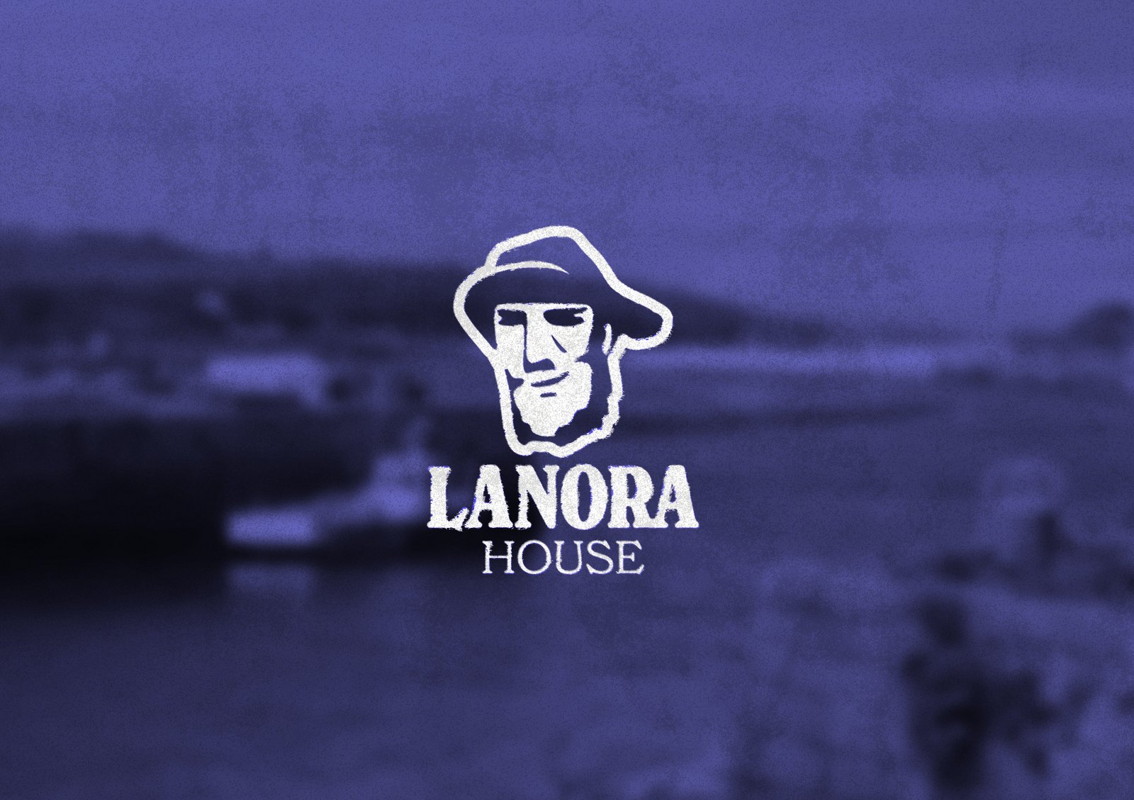 The Lanora House fisherman logo over a photograph of the wrapped van